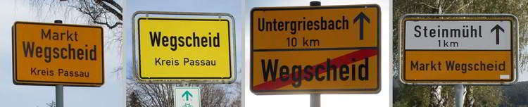 Verschiedene Wegscheider Ortstafeln zeigen Unterschiedliches